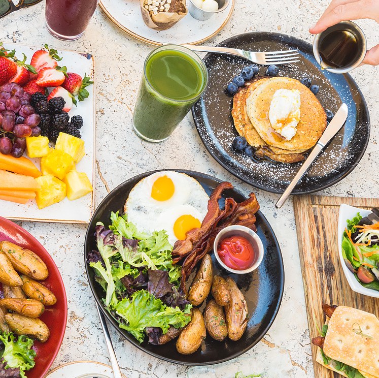 Plates of breakfast food