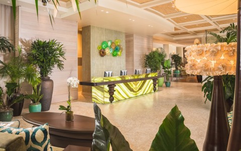 hotel reception desk with green lights