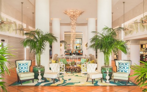 lobby sitting area with palm trees