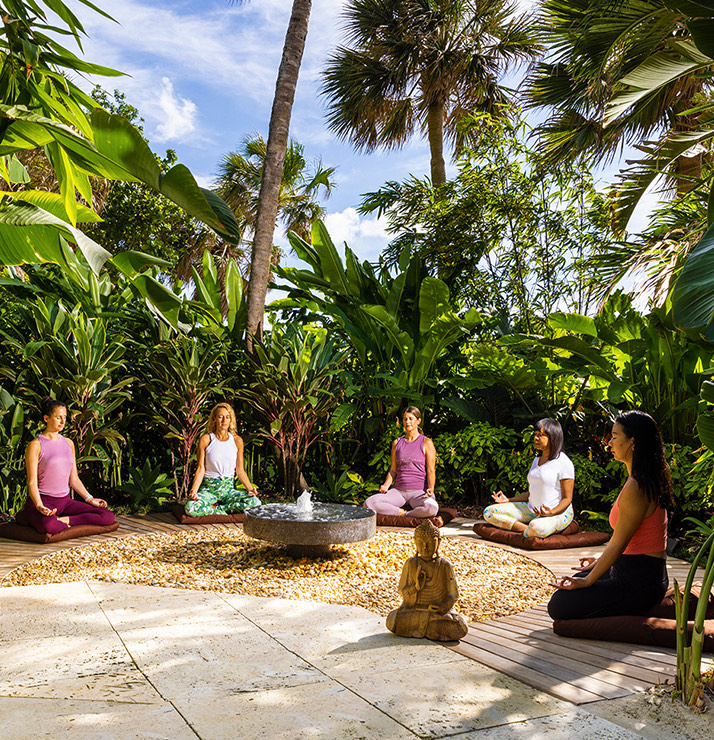 women meditating in the meditation garden
