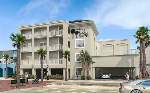 The Palms dark beige building with white balconies