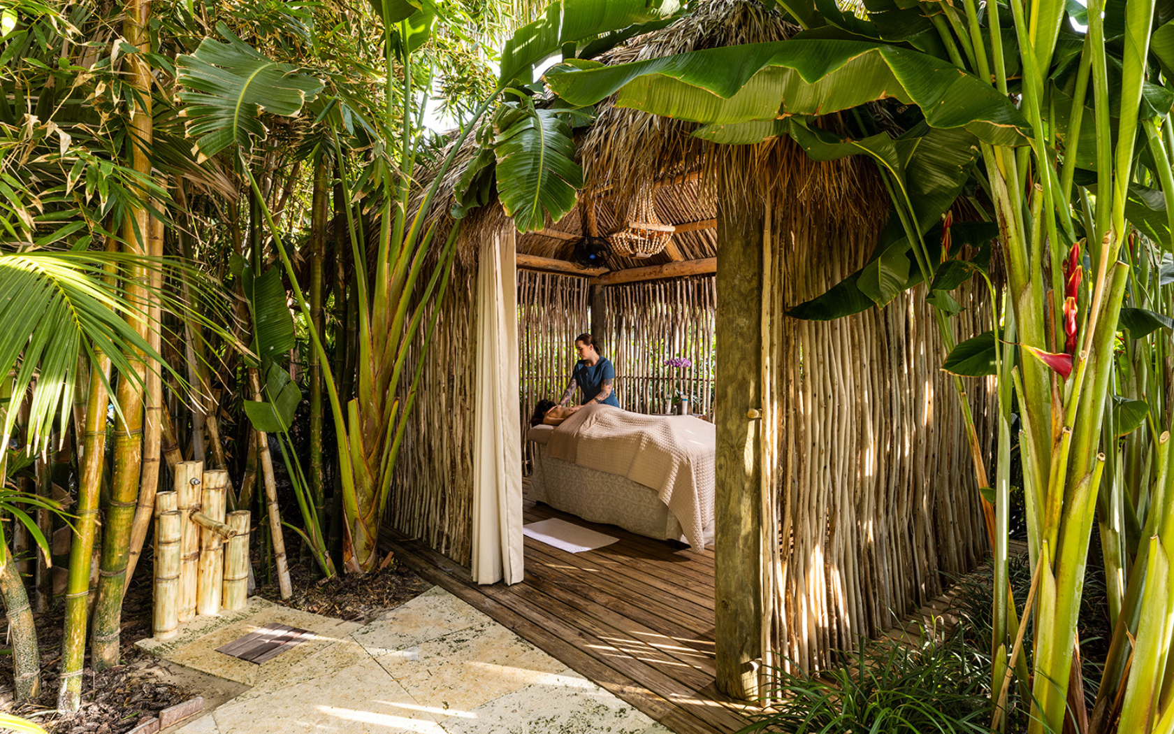 Outdoor massage cabana with therapist