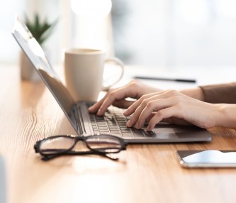 woman remote working at desk