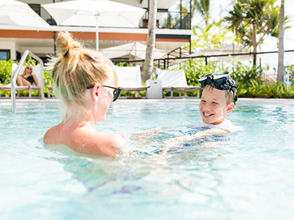 mother and son in the pool