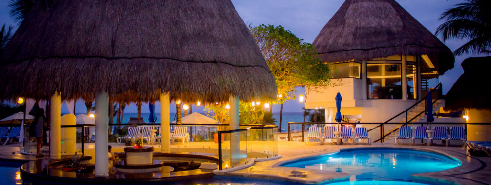 reef playacar pool at night