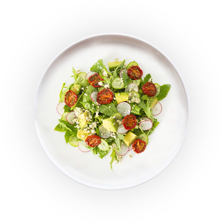 Top view of a plate with salad