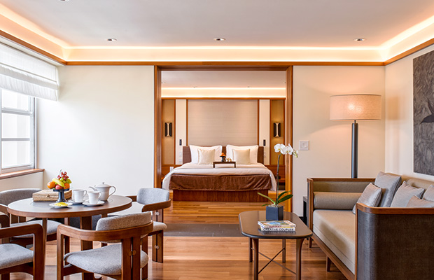 a large room with white walls and wood trim