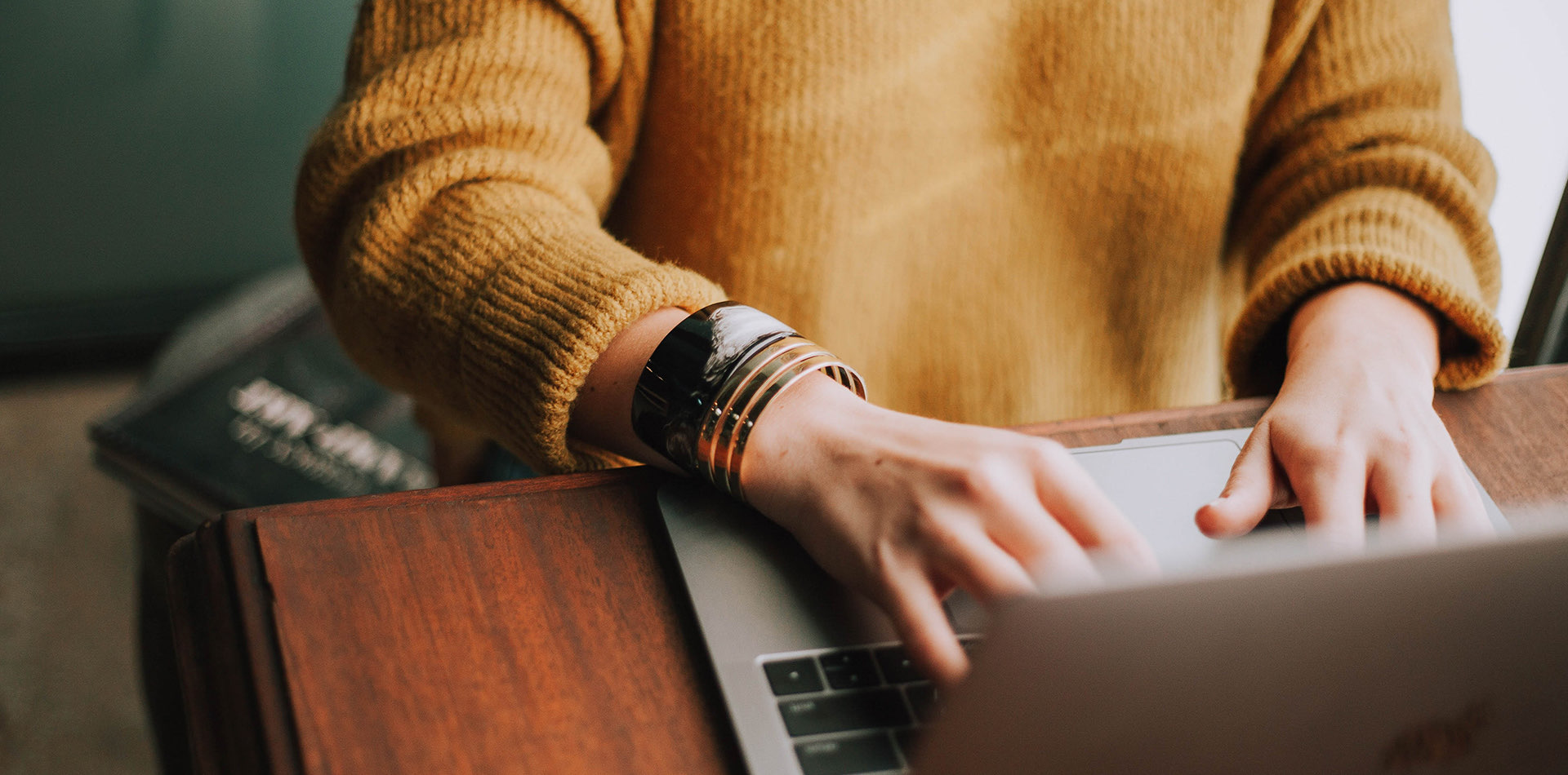person typing on computer