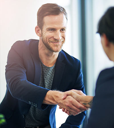 man shaking someones hand