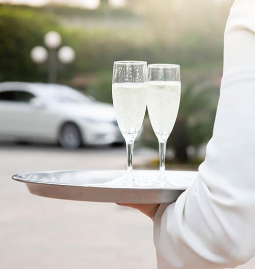 Spectator Butler with champagne