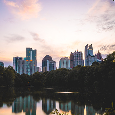 view of some city buildings at sunset