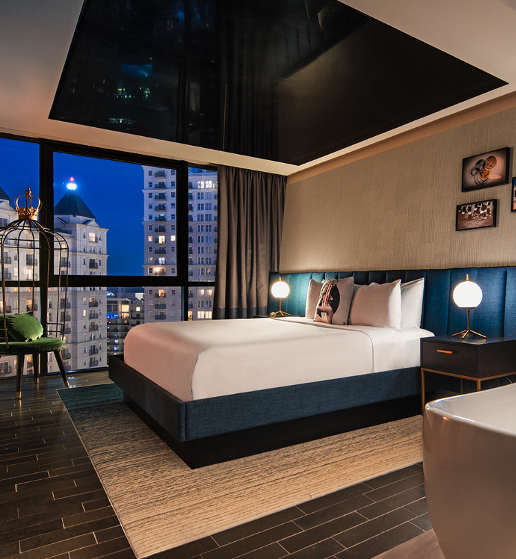 Hotel Room with large queen sized bed and floor to ceiling windows