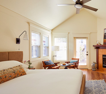 stavrand guest room with windows and door to outside