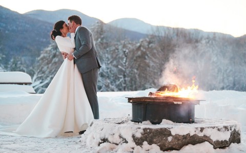 winter wedding by firepit