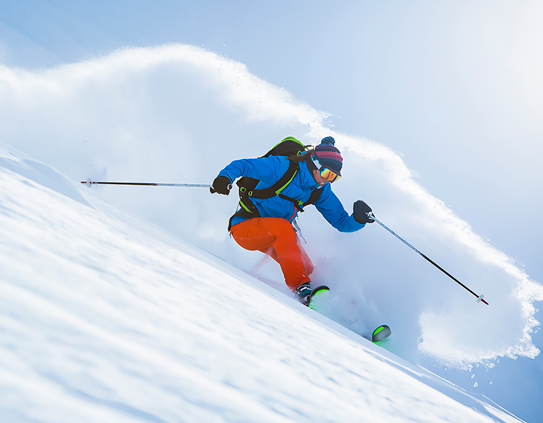 man skiing on the slopes