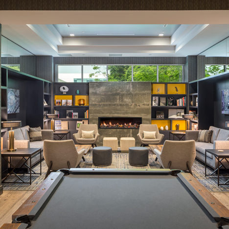 A cozy library with fireplace