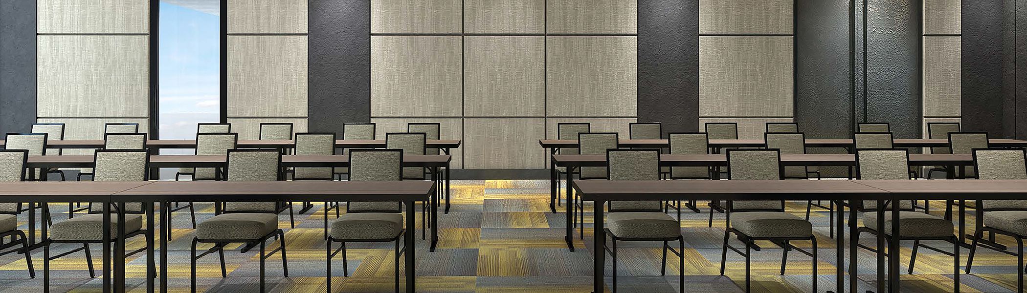 Room with rows of tables & chairs