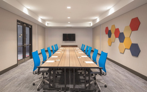 Conference room with geometric artwork on the walls