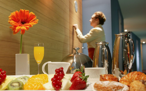 woman delivering room service