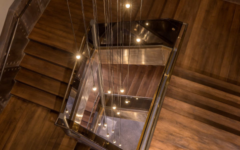 Spiral staircase with draping lights
