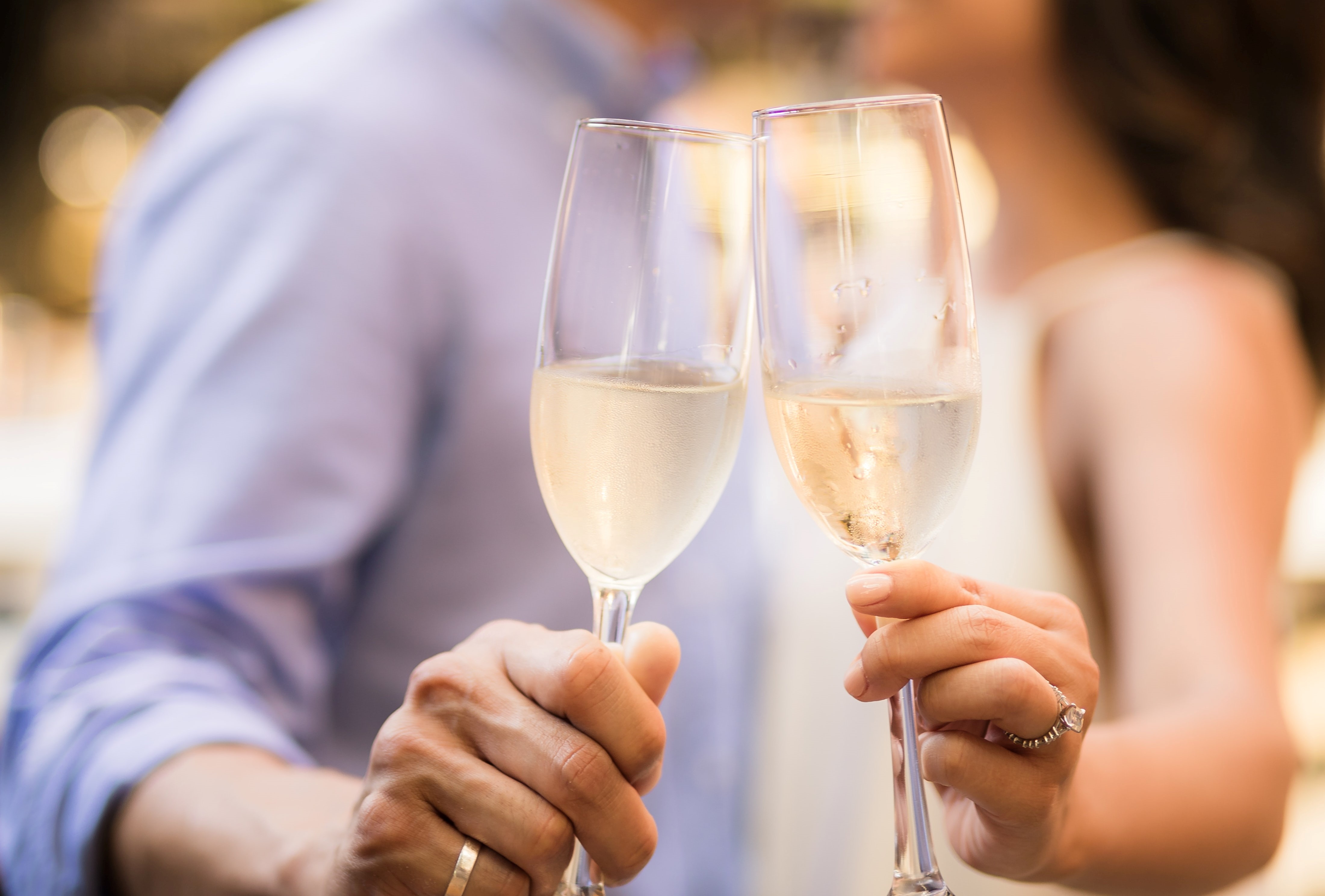 a couple toasting with champagne