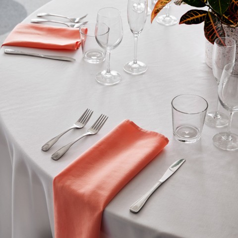 table set with cutlery and table cloth