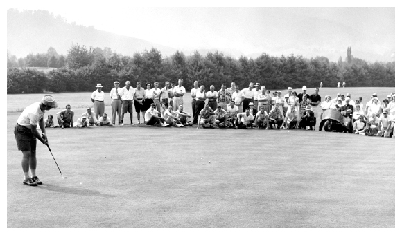Black and white image of a large group of golfers