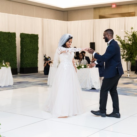 a bride and groom dancing at their wedding