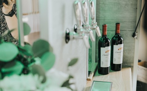 wine bottles on beverage bar