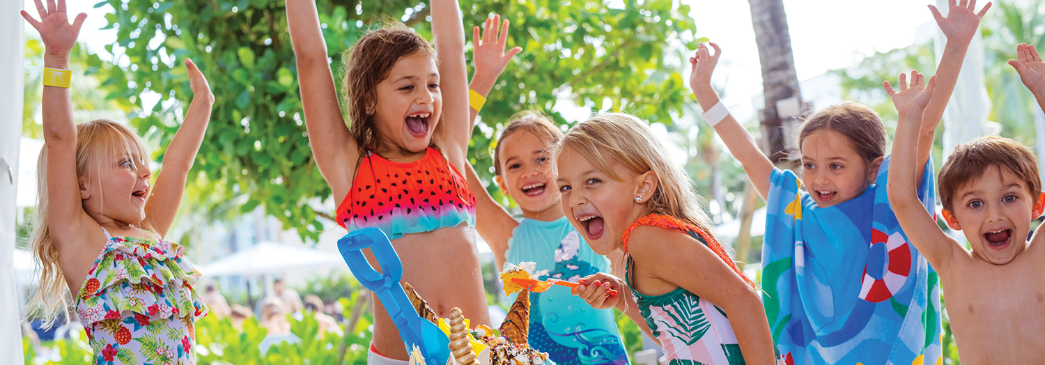 kids having fun in a party smiling and happy