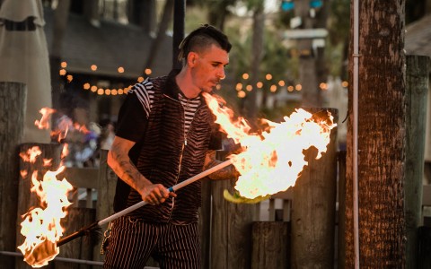 performer using fire for the show