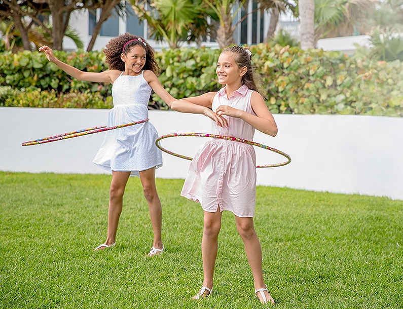 two girls hoola hooping