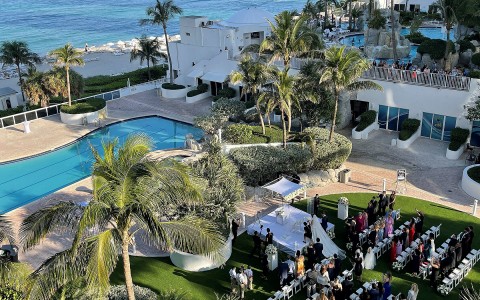 aerial view of a wedding at Trump Miami's lawn and pool deck