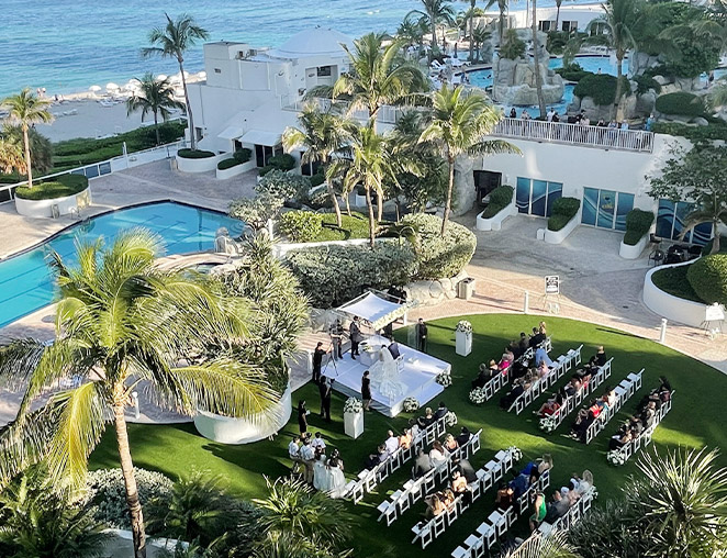 aerial view of a lawn and pool deck wedding at Trump Beach Resort