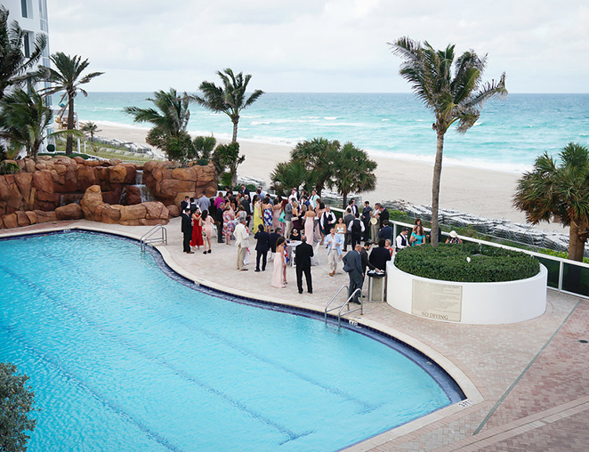 overhead view of Trump Miami's pool and a group of wedding guests