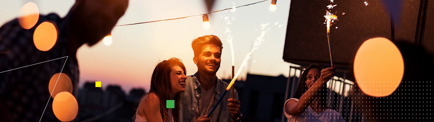 couple holding fireworks