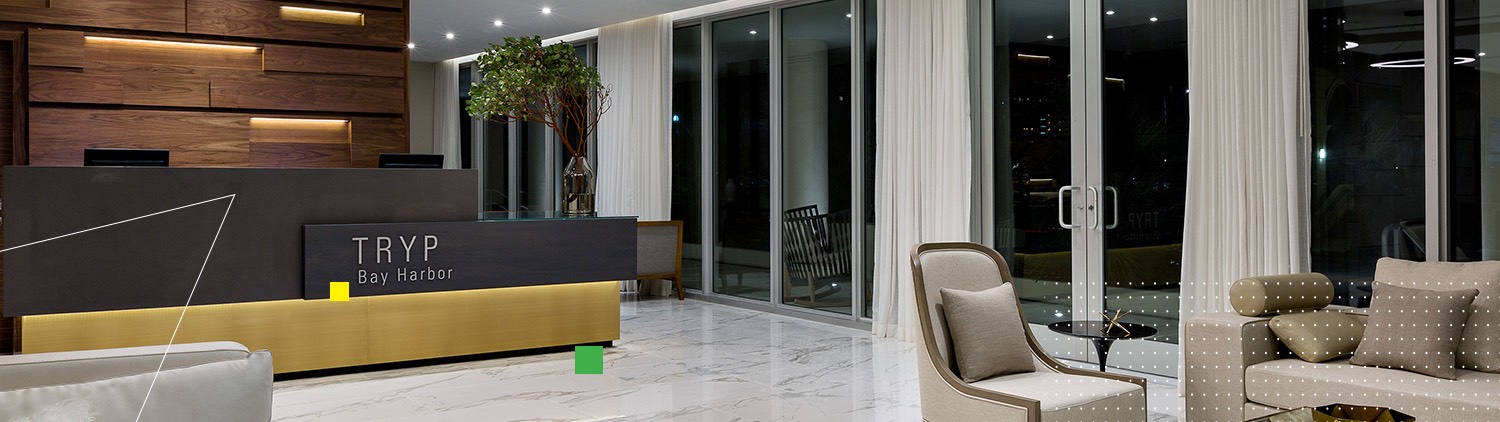 Tryp Miami hotel front desk and sitting area