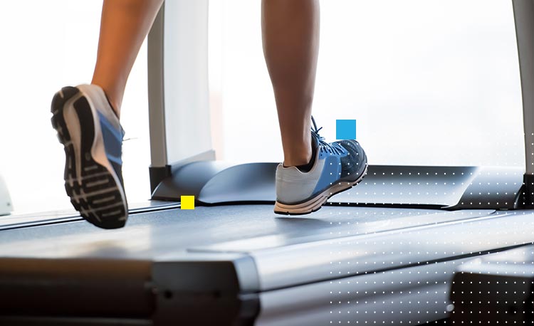 person running on treadmill