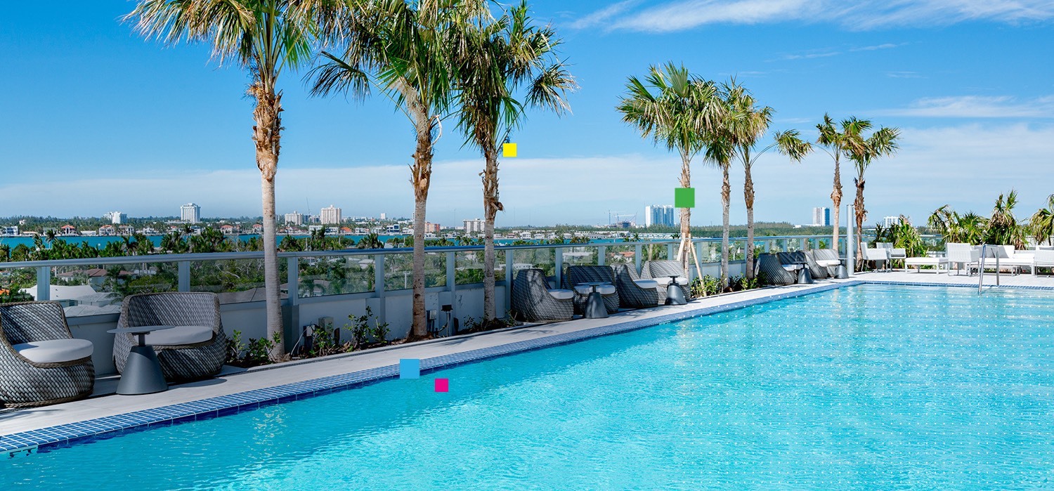 beautiful sunny view from the pool deck overlooking the Miami skyline