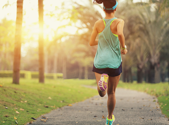 person running along a jogging trail