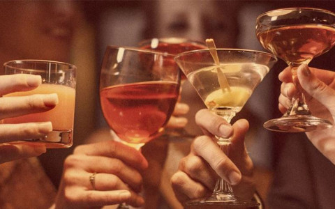 cocktails clinking for a toast
