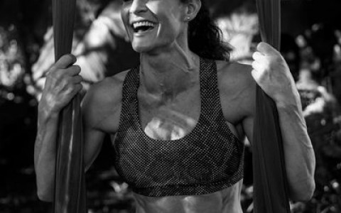 Woman in workout clothes doing aerobics