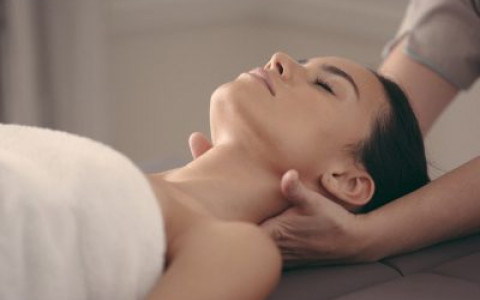 Woman getting neck massage