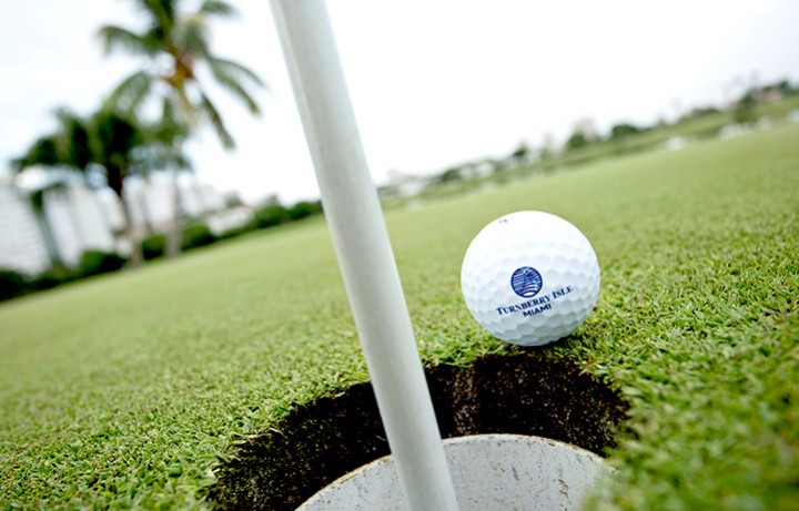 Golf ball going into hole at Turnberry Country Club