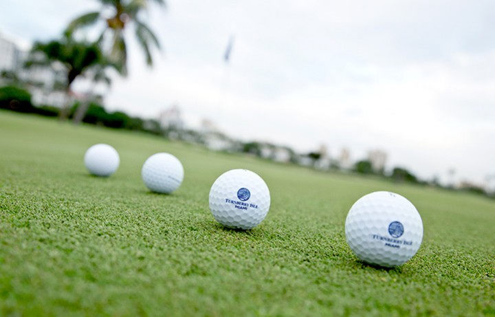 Golf balls lined up at Turnberry Country Club