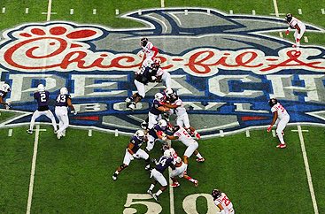Overhead view of football players playing at the Chick fil a Bowl