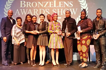 group of people accepting an award