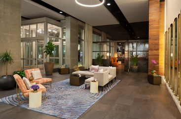 lobby with chairs and sofa at night time