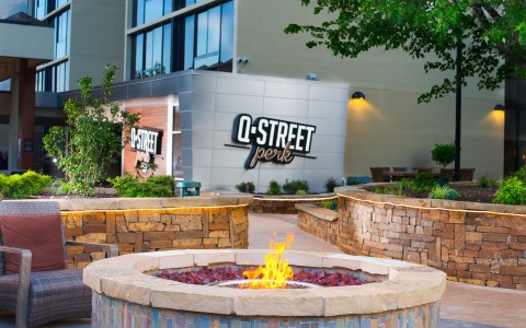 Q Street Perk entrance with fire pit 