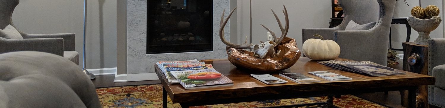 wooden table with animal antlers on table